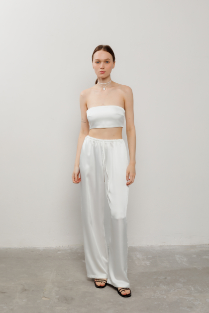 Атласні штани вільного крою з кишенями