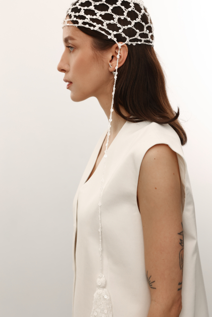 В'язана шапочка з китицями